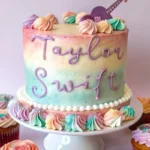 Taylor Swift-inspired birthday cake with vibrant sprinkles and layers.